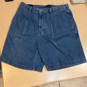 Men’s pleated jean shorts.  New with tags, never worn size 34